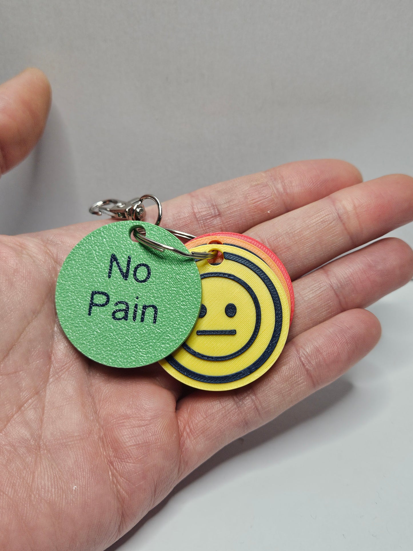 Pain Level Communication Tags – 3D Printed Emotion Keyrings (Set of 4 tags)
