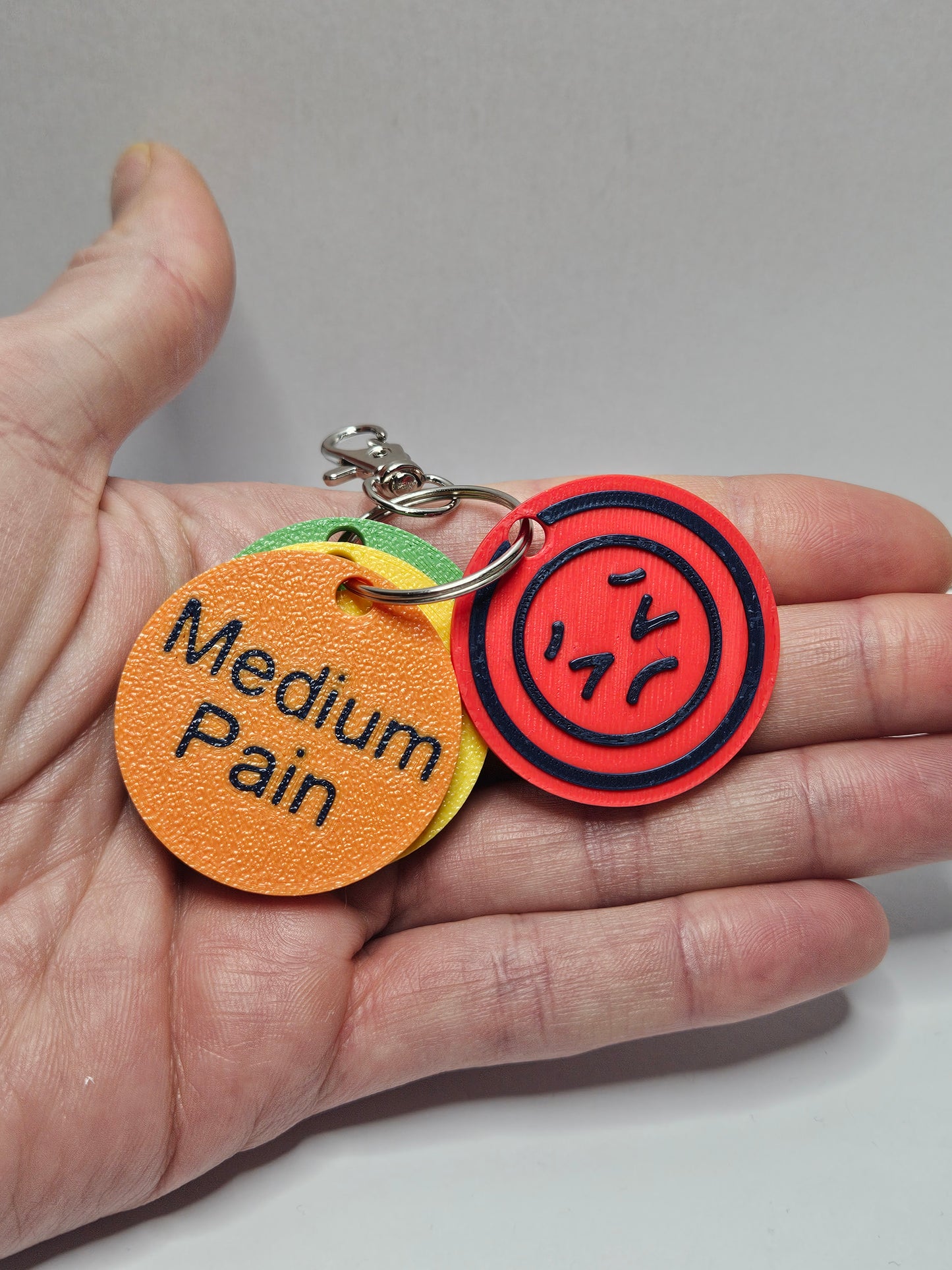 Pain Level Communication Tags – 3D Printed Emotion Keyrings (Set of 4 tags)