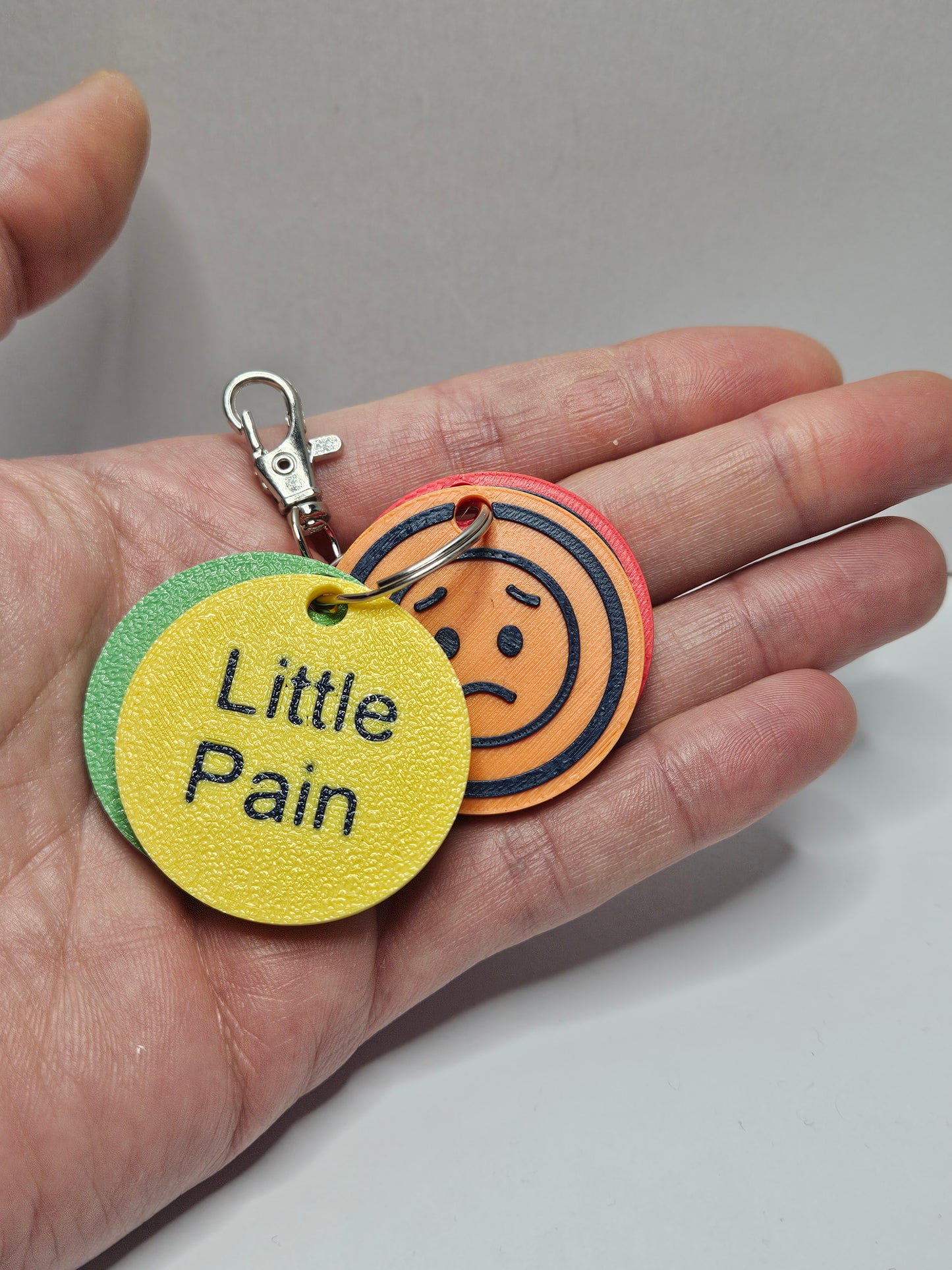 Pain Level Communication Tags – 3D Printed Emotion Keyrings (Set of 4 tags)